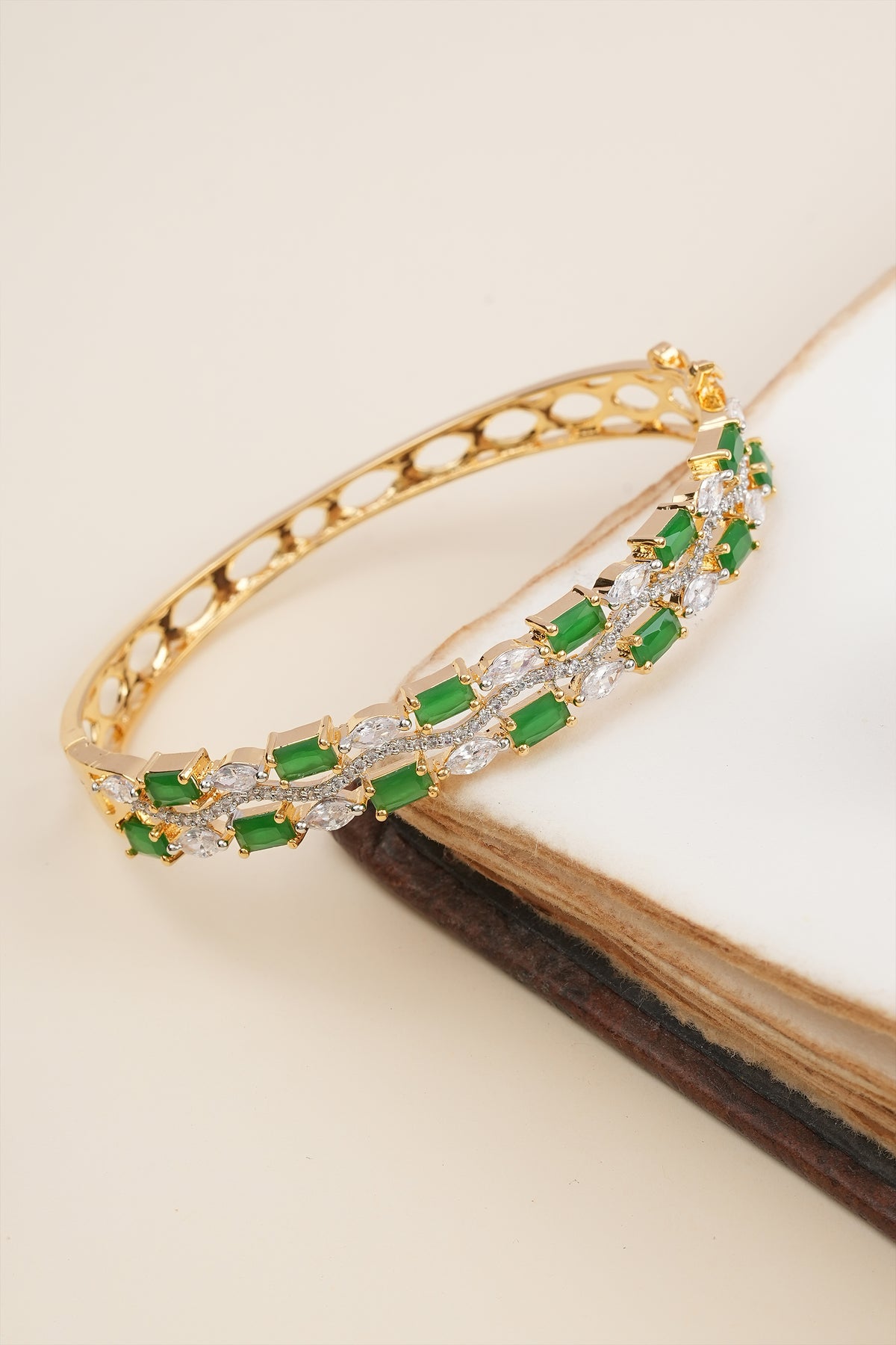gold-plated emerald green and white cubic zirconia studded cuff bracelet