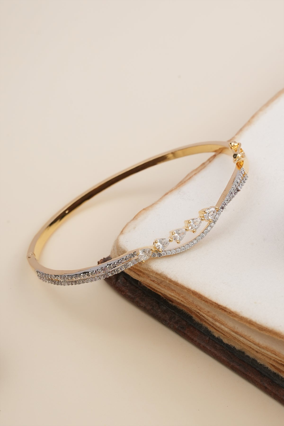 Elegant Gold & Diamond Twist Bangle Bracelet