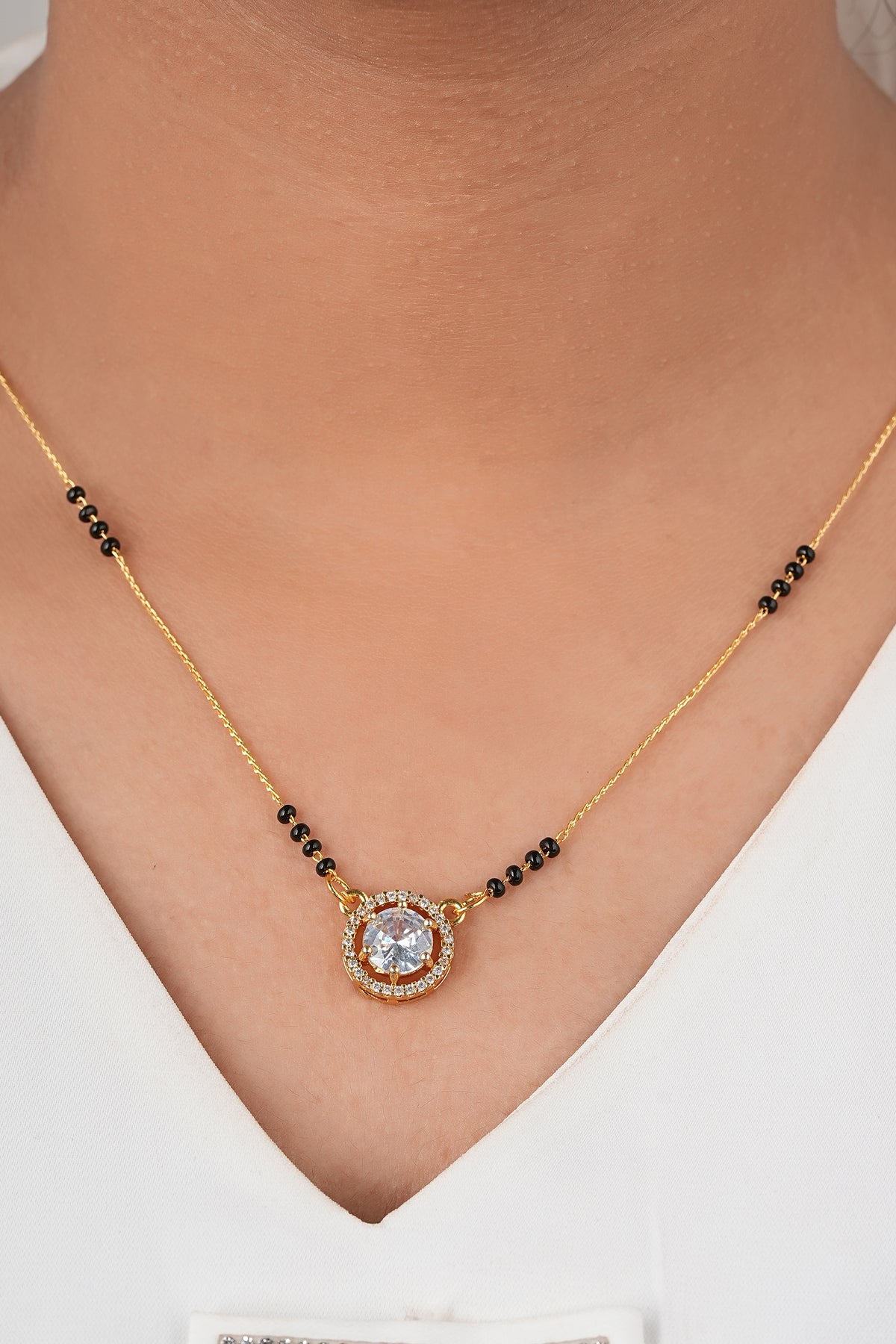 Halo Solitaire Mangalsutra by Temple Dollar - central CZ ringed by a sparkling halo