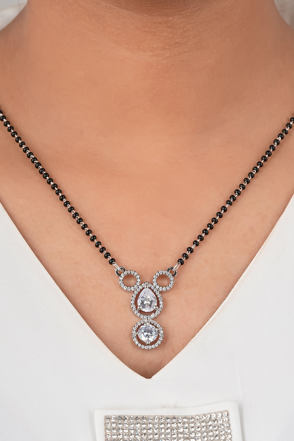 Geometric Radiance Mangalsutra by Temple Dollar - angular lines with bright CZ sparkle
