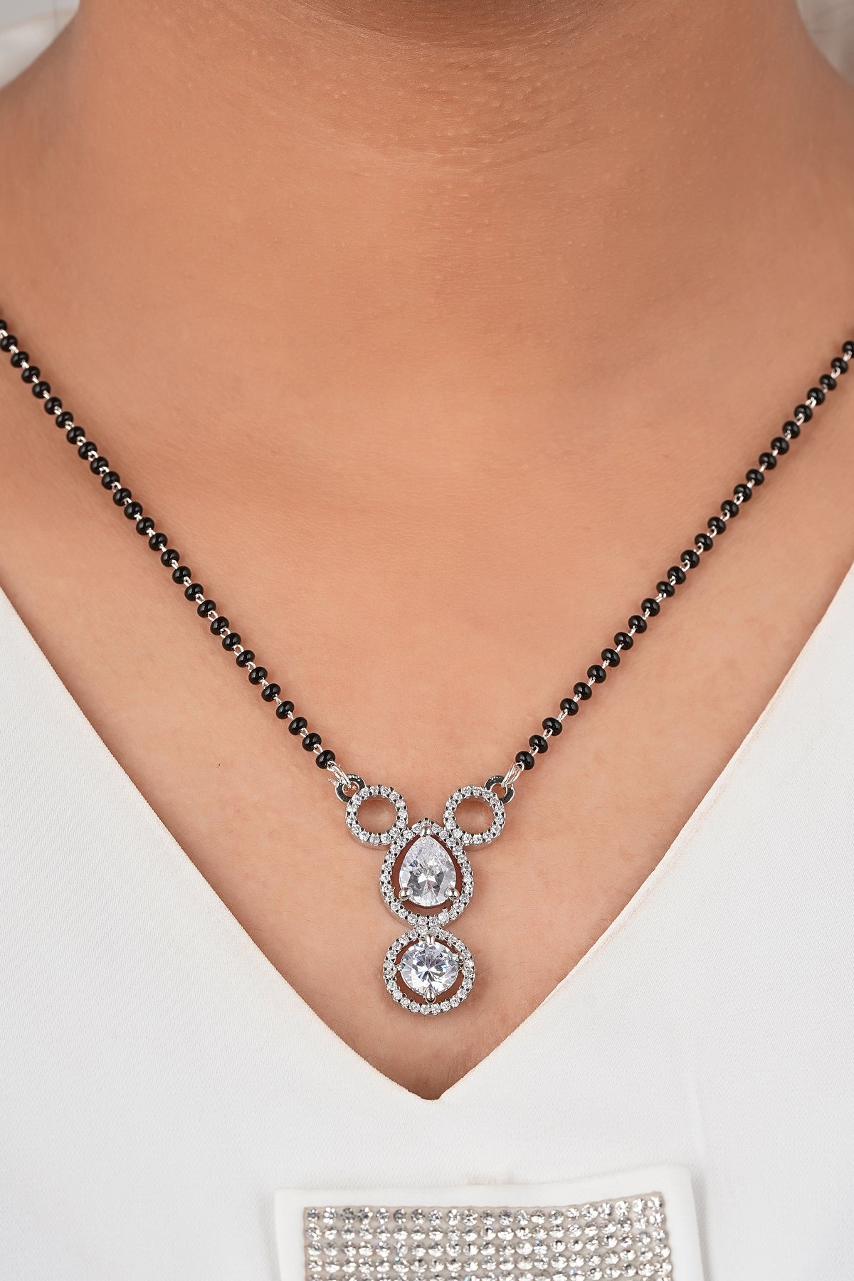 Geometric Radiance Mangalsutra by Temple Dollar - angular lines with bright CZ sparkle