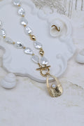 Artisan Gold-tone Toggle Necklace Featuring Baroque Pearls and Inset Detail