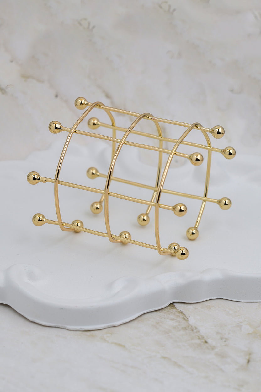 Gold Orbital Grid Cuff