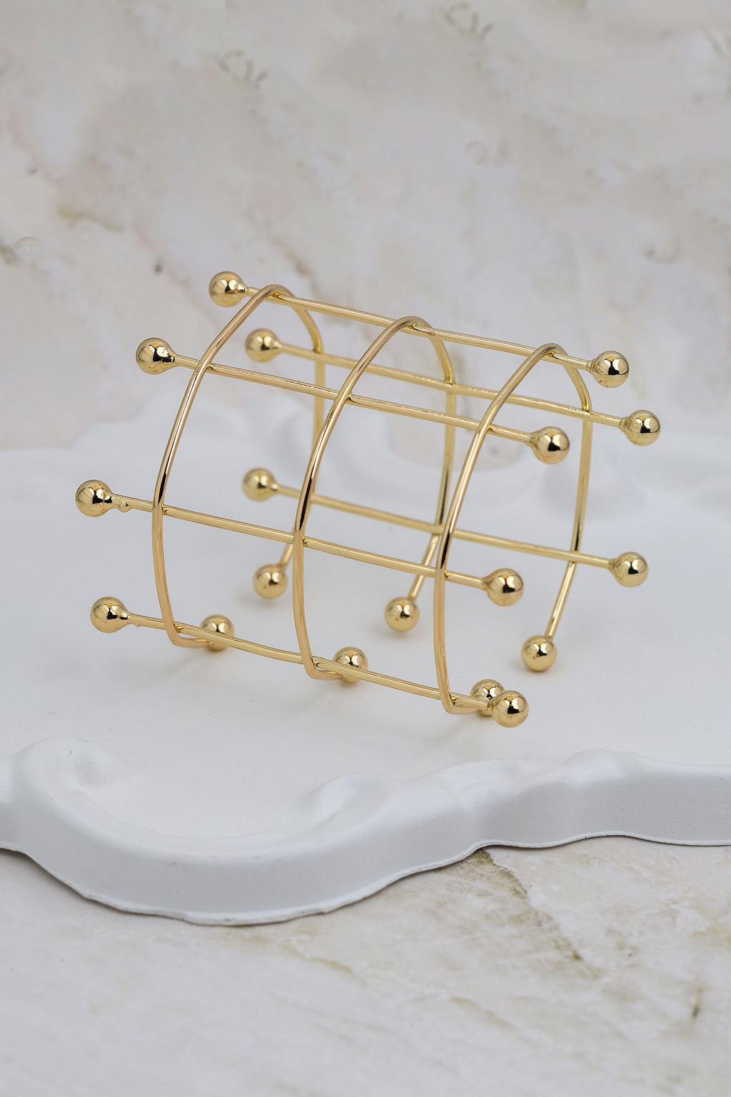 Gold Orbital Grid Cuff