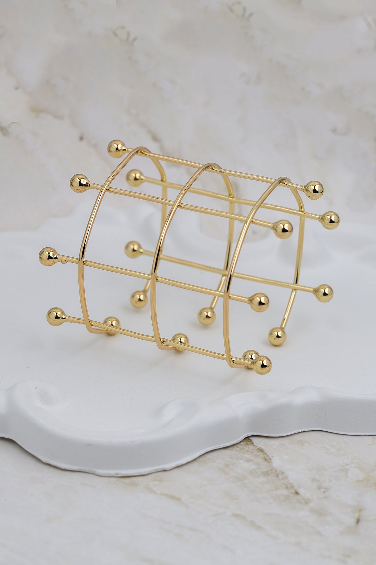 Gold Orbital Grid Cuff
