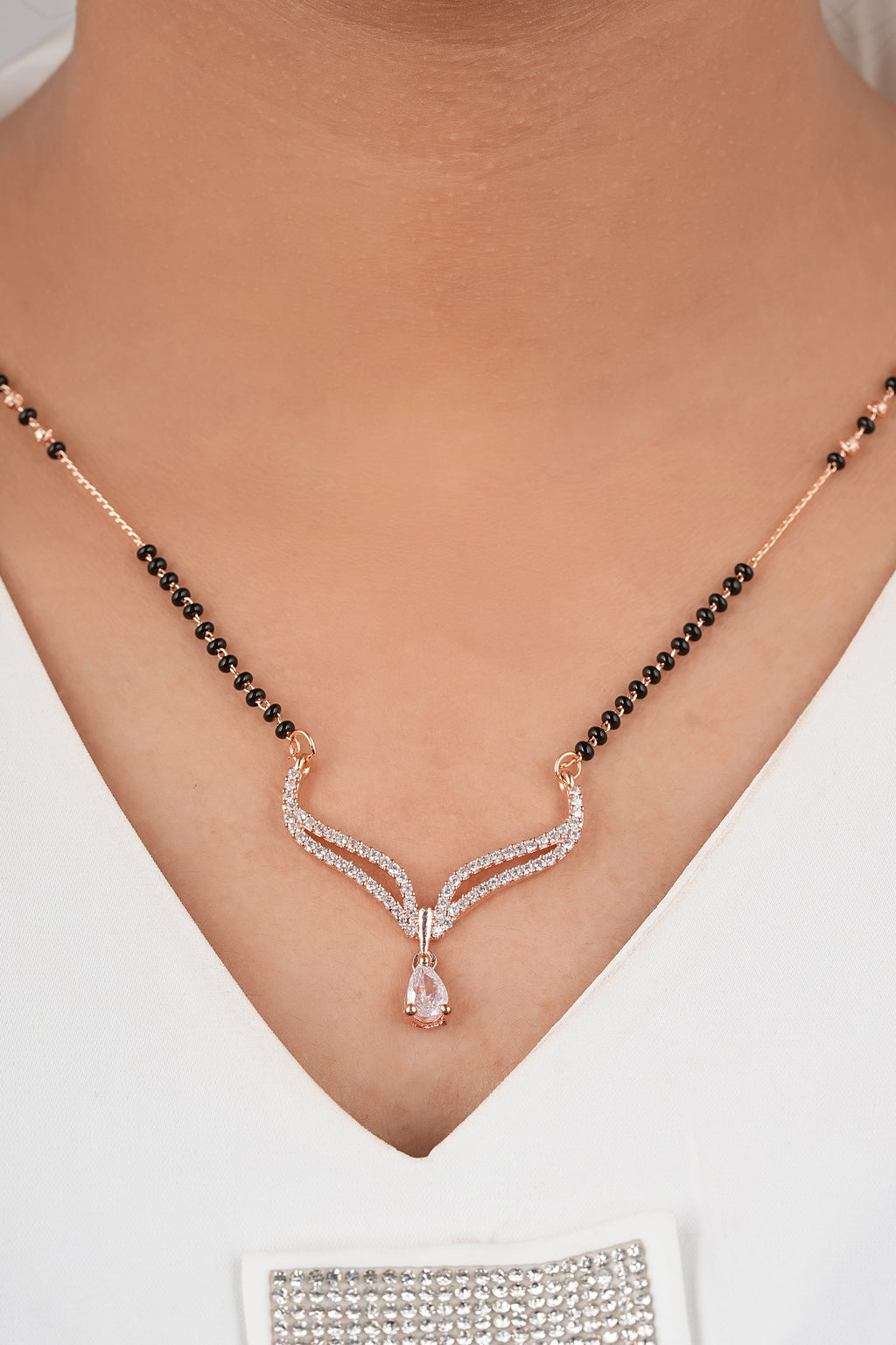Ethereal Rose-Toned Mangalsutra by Temple Dollar - delicate pendant with gentle CZ shimmer