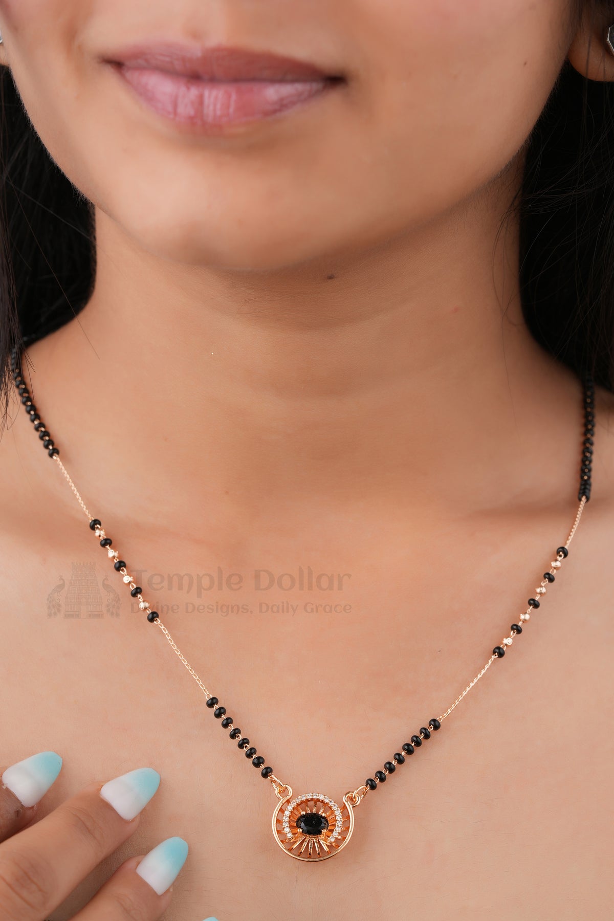 Sapphire Sunburst Pendant Mangalsutra by Temple Dollar - sunburst pendant with a blue centre stone