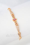 Rose Gold Designer Bracelet with Ruby Oval Cluster Center
