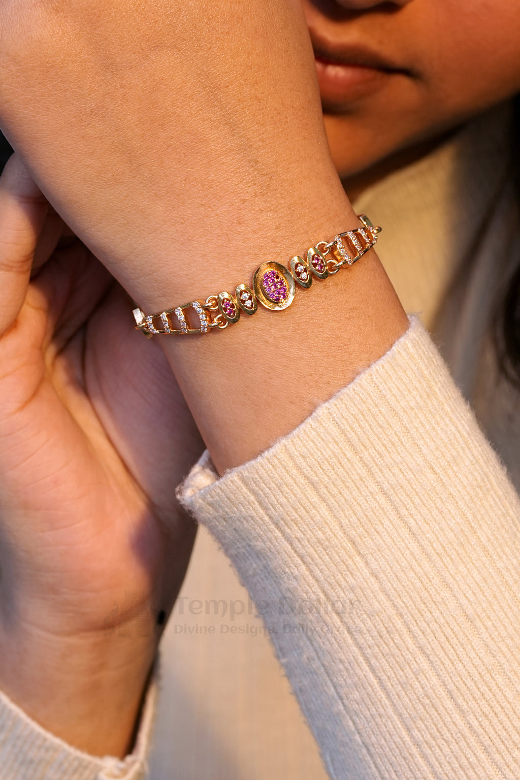 Rose Gold Designer Bracelet with Ruby Oval Cluster Center