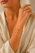 Gold Orbital Grid Cuff