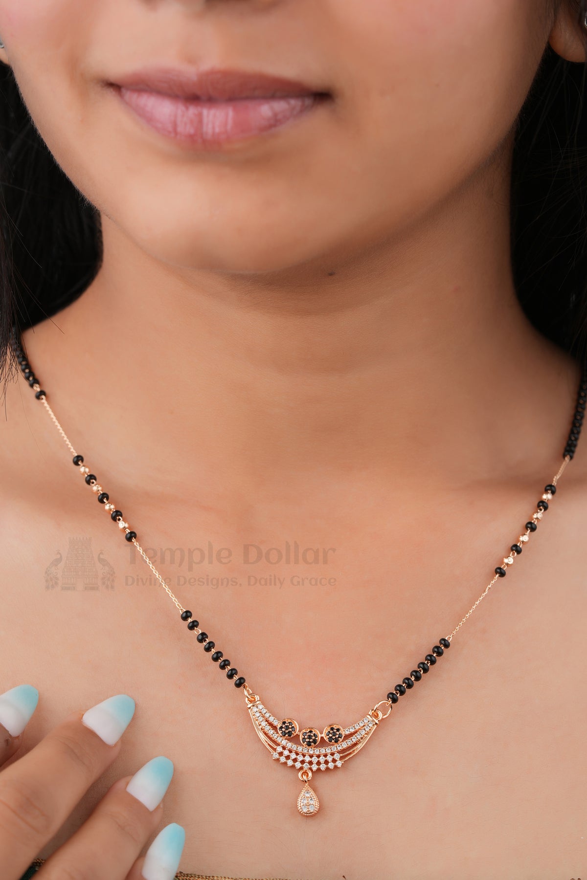 Royal Floral Arc Mangalsutra by Temple Dollar - layered floral pendant with a crystal drop centre