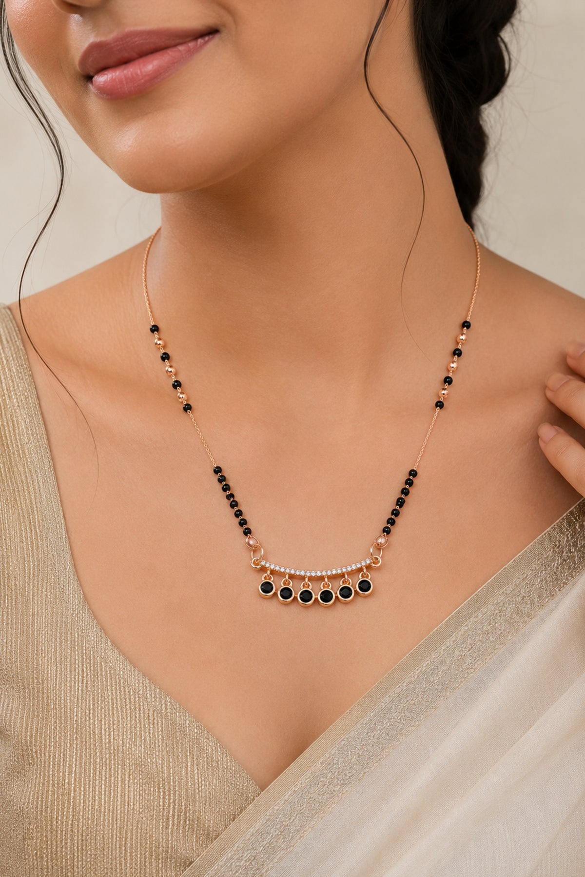 Dainty Rose-Toned Fringe Mangalsutra by Temple Dollar - slim bar with a fringe of charms